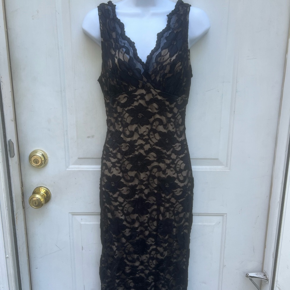Mica brand lace dress with beige underlay   size (M) curve hugging stretchy fit
